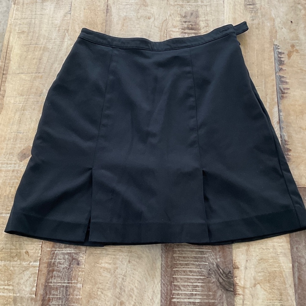 Tail ladies golf skort. Black A-Line Skirt with Front Slits size 4.